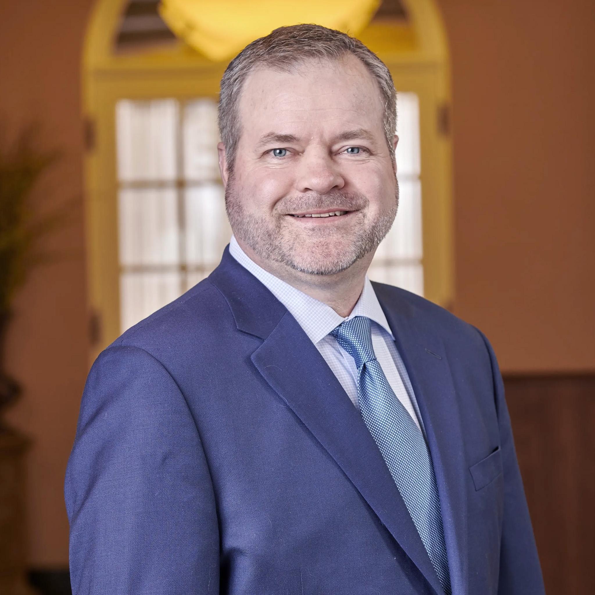 Portrait of Tom O'Connor smiling